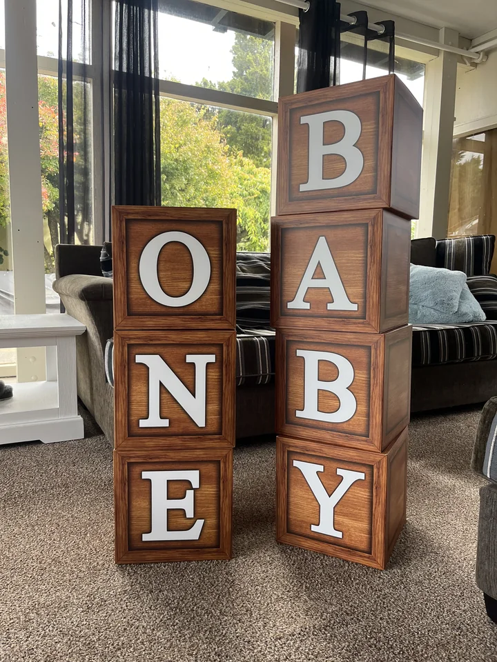 Woodgrain BABY and ONE decorative boxes available for party hire.